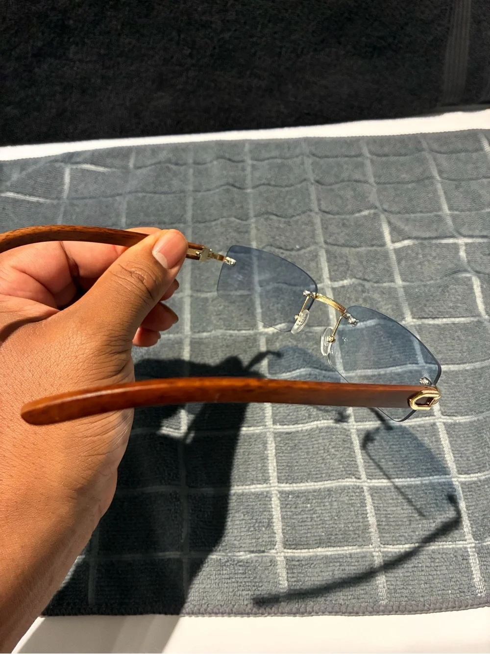 Rimless Blue Lens Sunglasses with Wood Arms and Gold Bridge